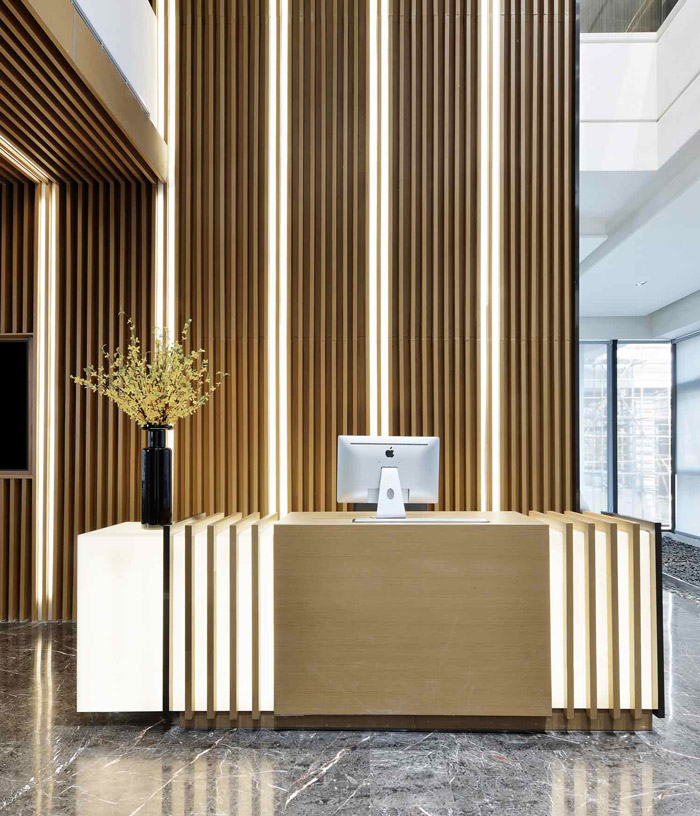 綠色環保辦公室前臺裝修設計效果圖